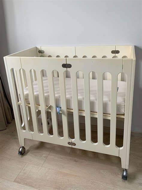 alma mini crib used.